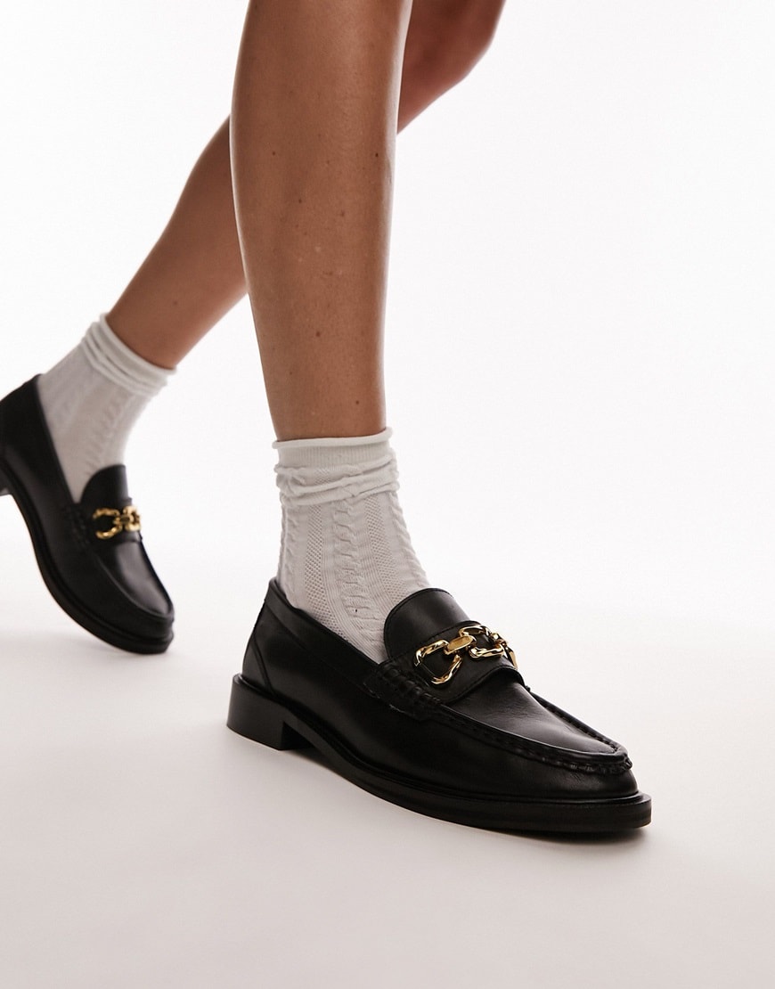 A woman wearing black loafers with white socks | ASOS Style Feed