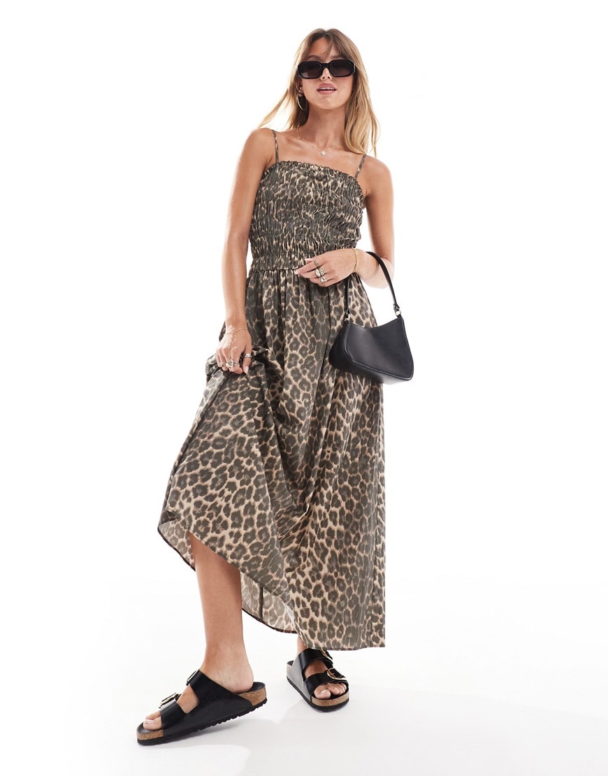 A woman wearing a leopard print maxi dress | ASOS Style Feed