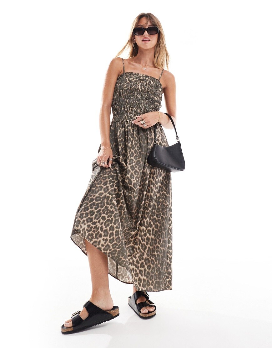 A woman wearing a leopard print maxi dress | ASOS Style Feed