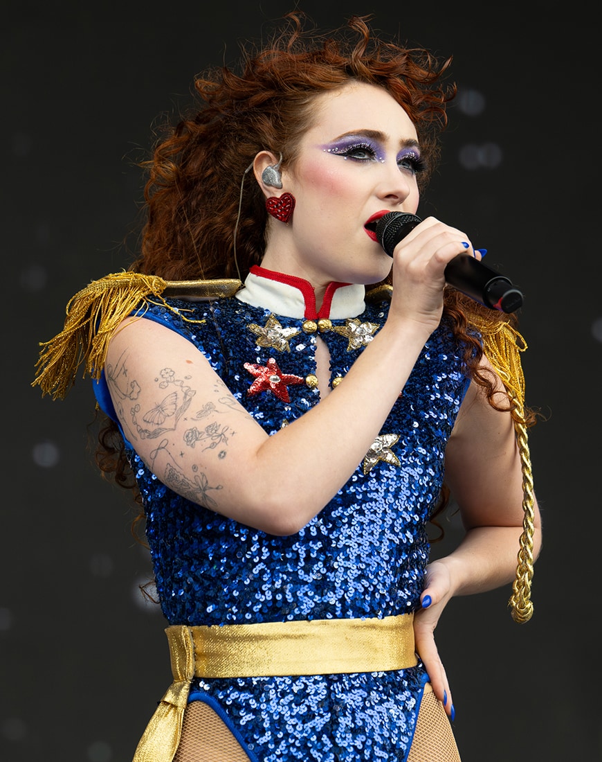 Chappell Roan wearing her outfit from HOT TO GO! While on stage