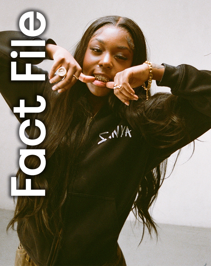 Liz Sanya wearing a black "SANYA" hoodie