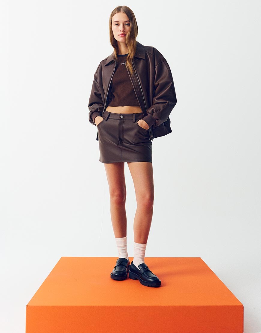 Model wearing Calvin Klein Jeans brown leather co-ord | ASOS Style Feed