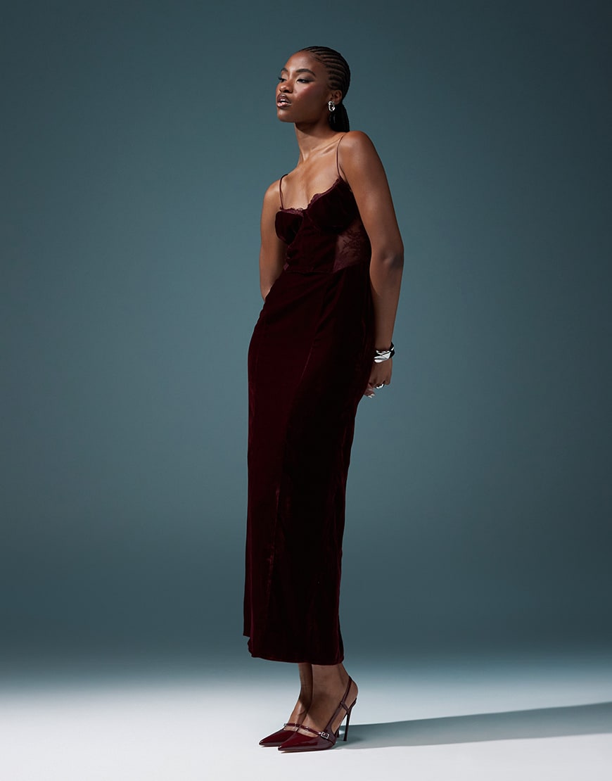 Model wearing black lace detail maxi dress