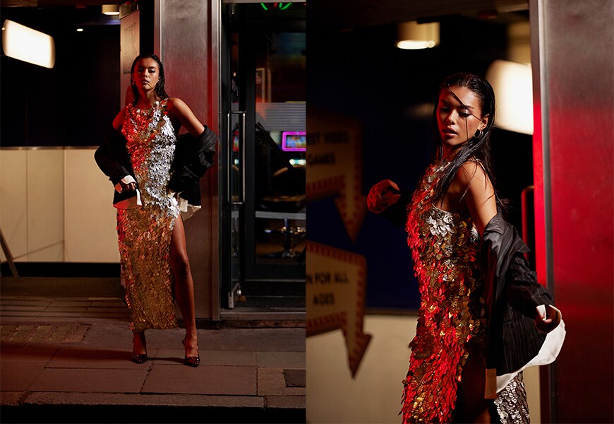 Model wearing sparkly silver dress on the streets