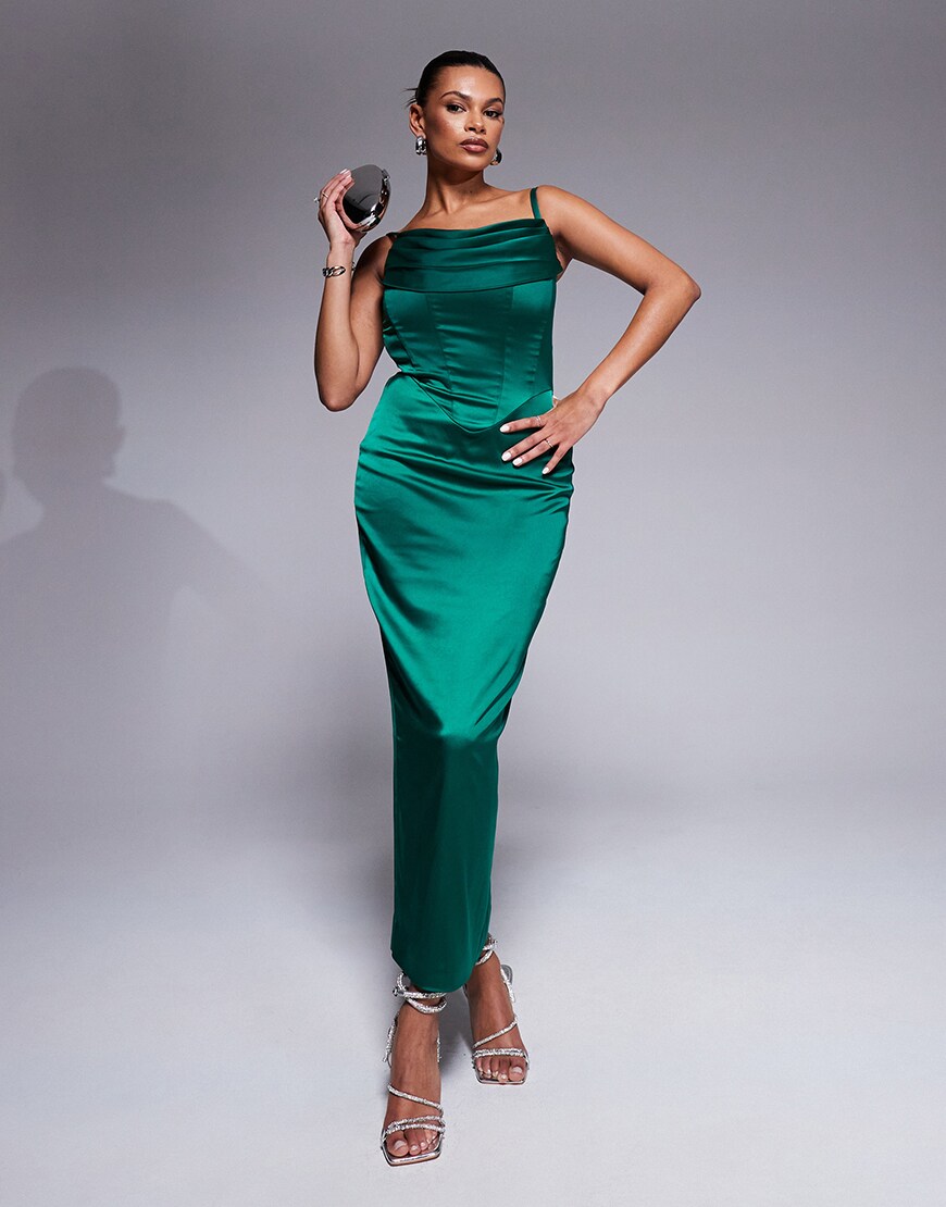 Model wearing a green maxi Taideux dress