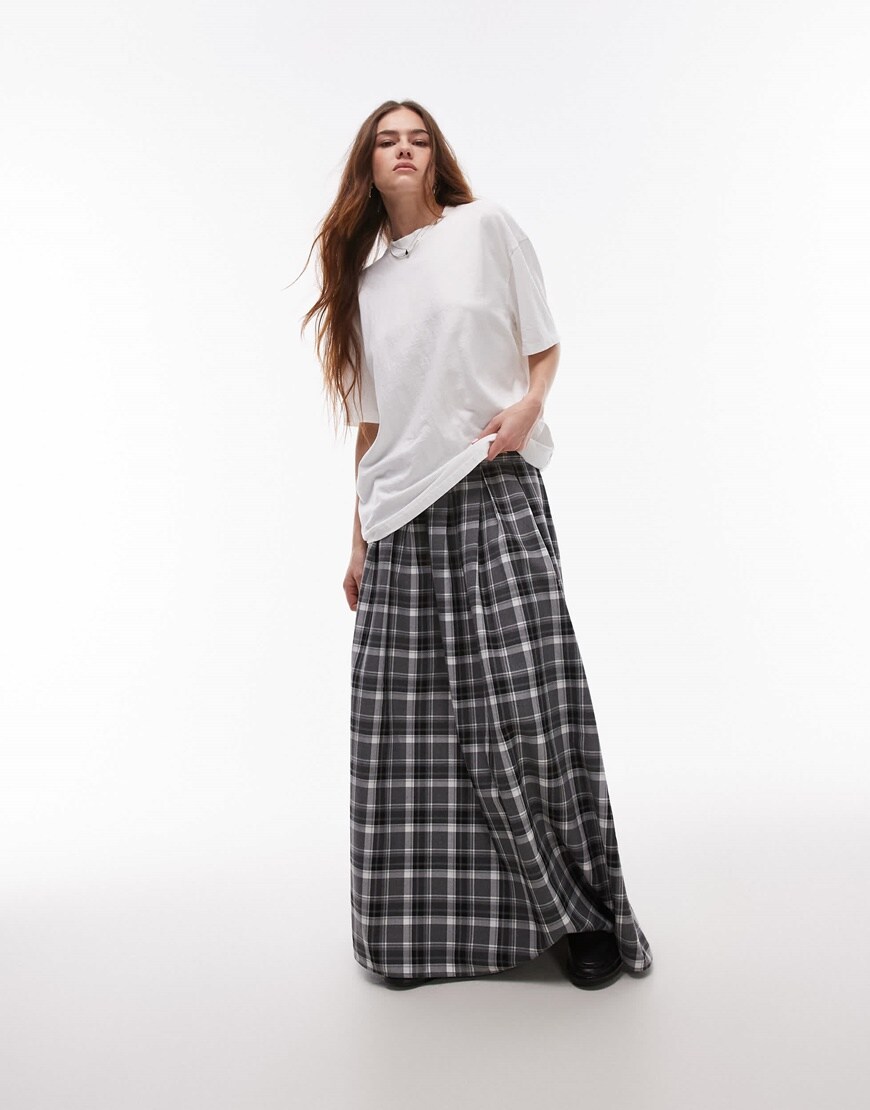 A model wearing a checked print maxi skirt | ASOS Style Feed