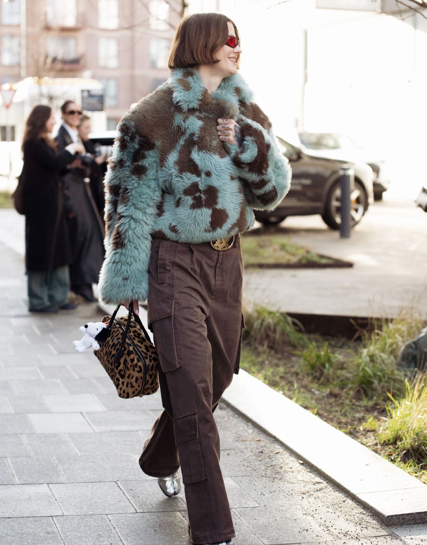 Woman Wearing Cow-Print Coat