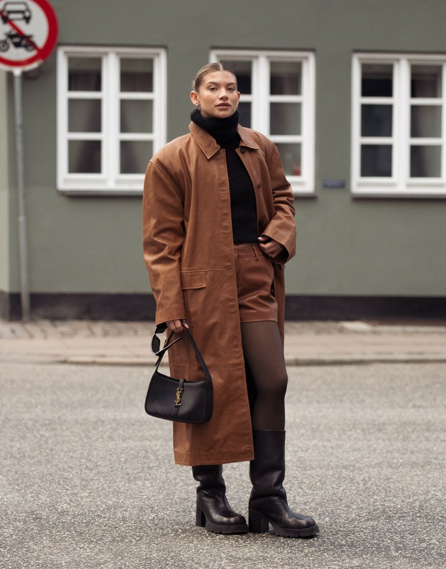 Woman Wearing Brown Leather Coat
