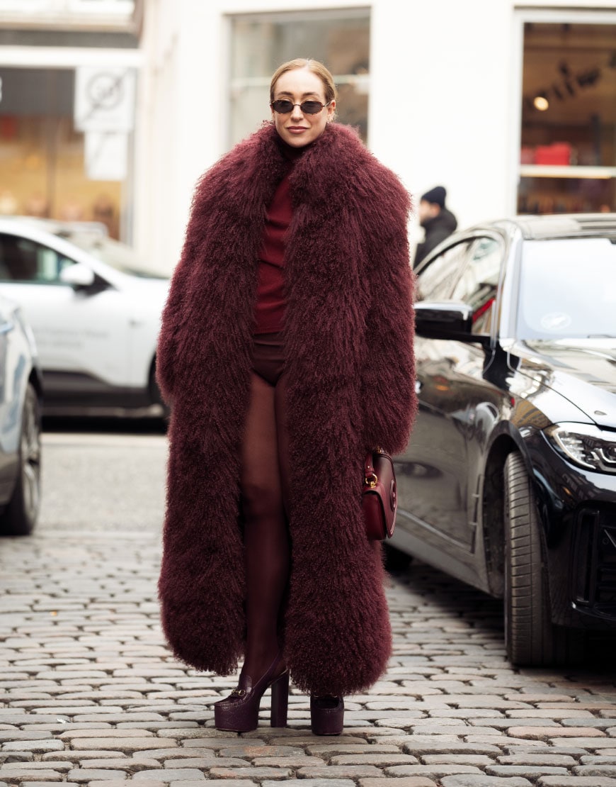 Woman Wearing Burgundy Fluffy Coat