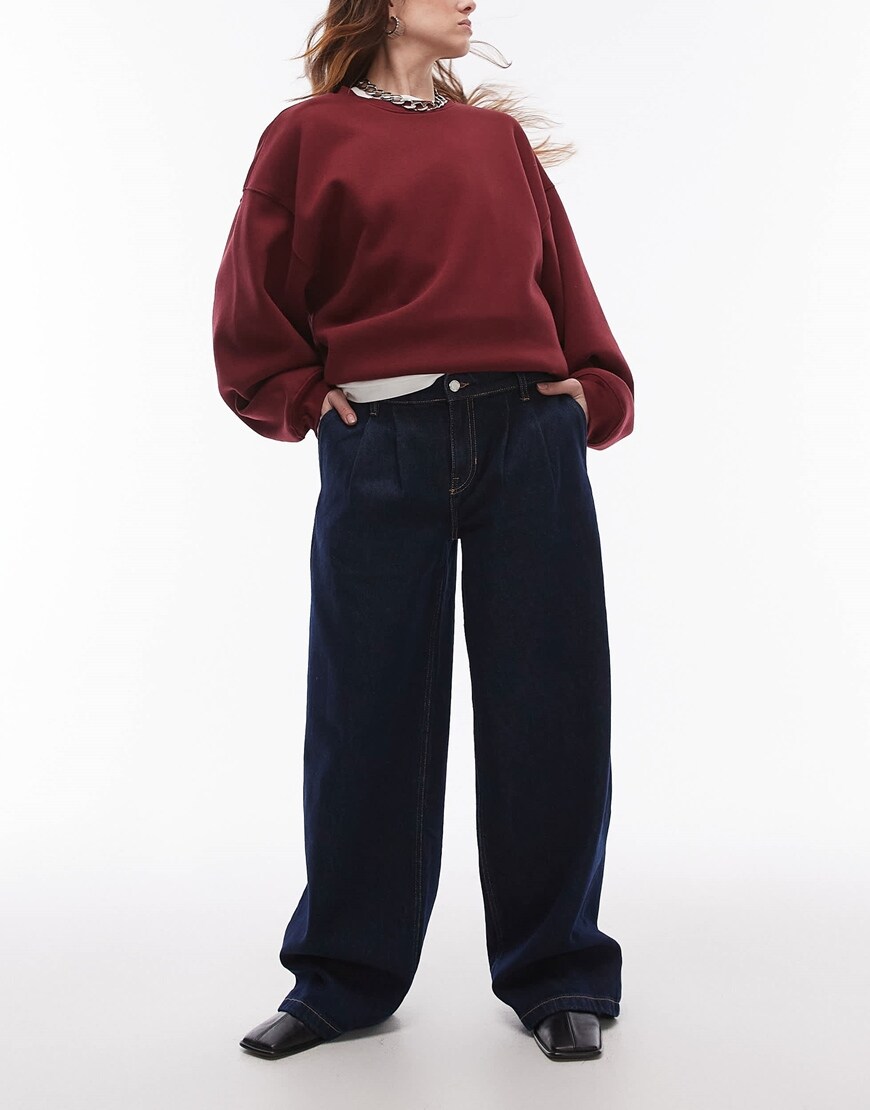 Model wearing oversized jeans