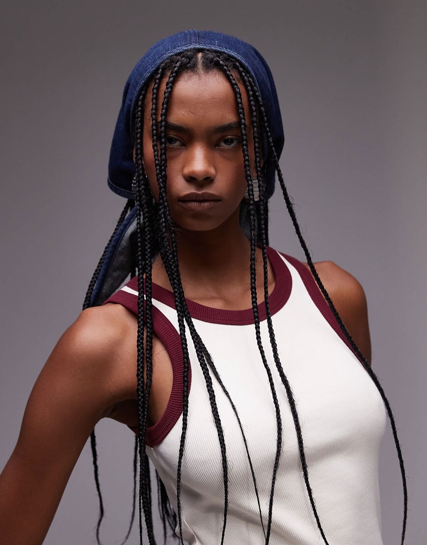 Model wearing dark blue denim head scarf