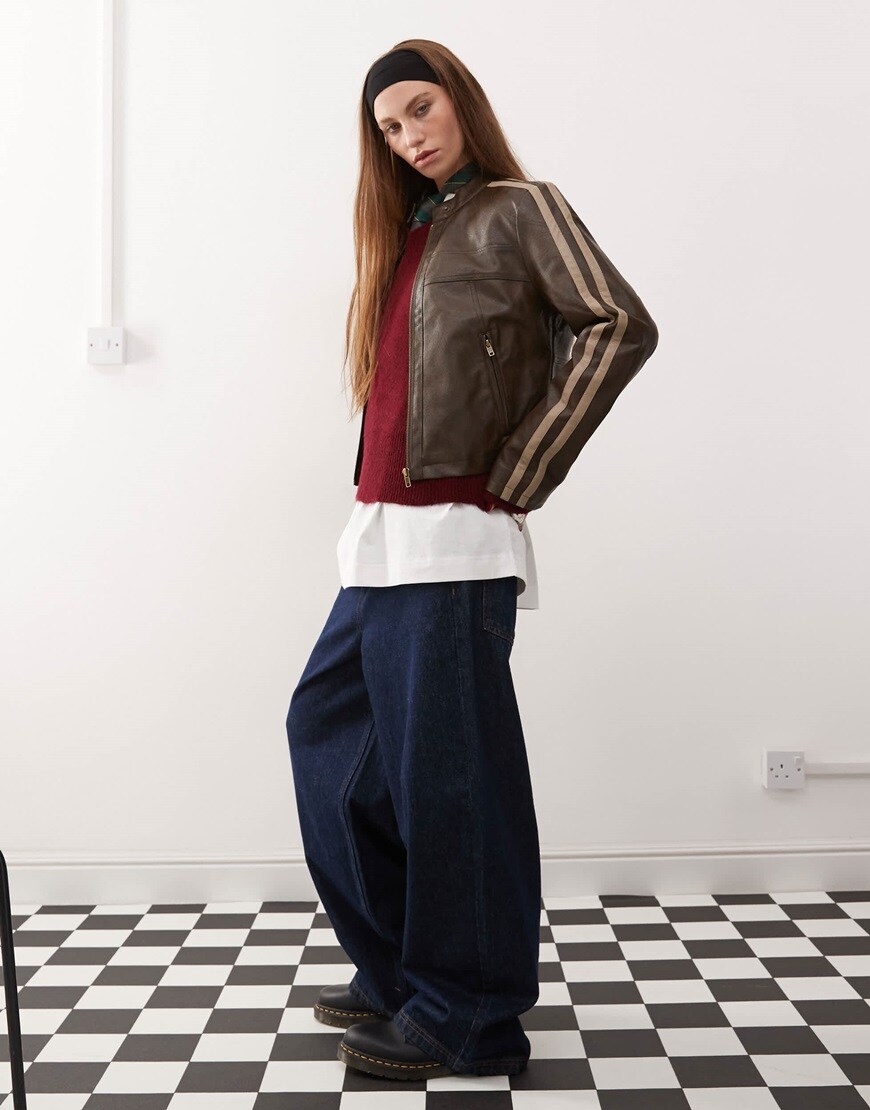 Woman wearing oversized leather jacket