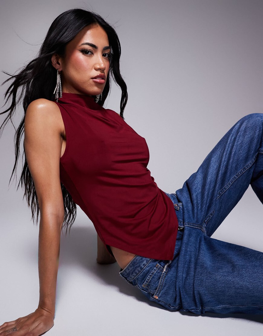 model wearing a black corset top