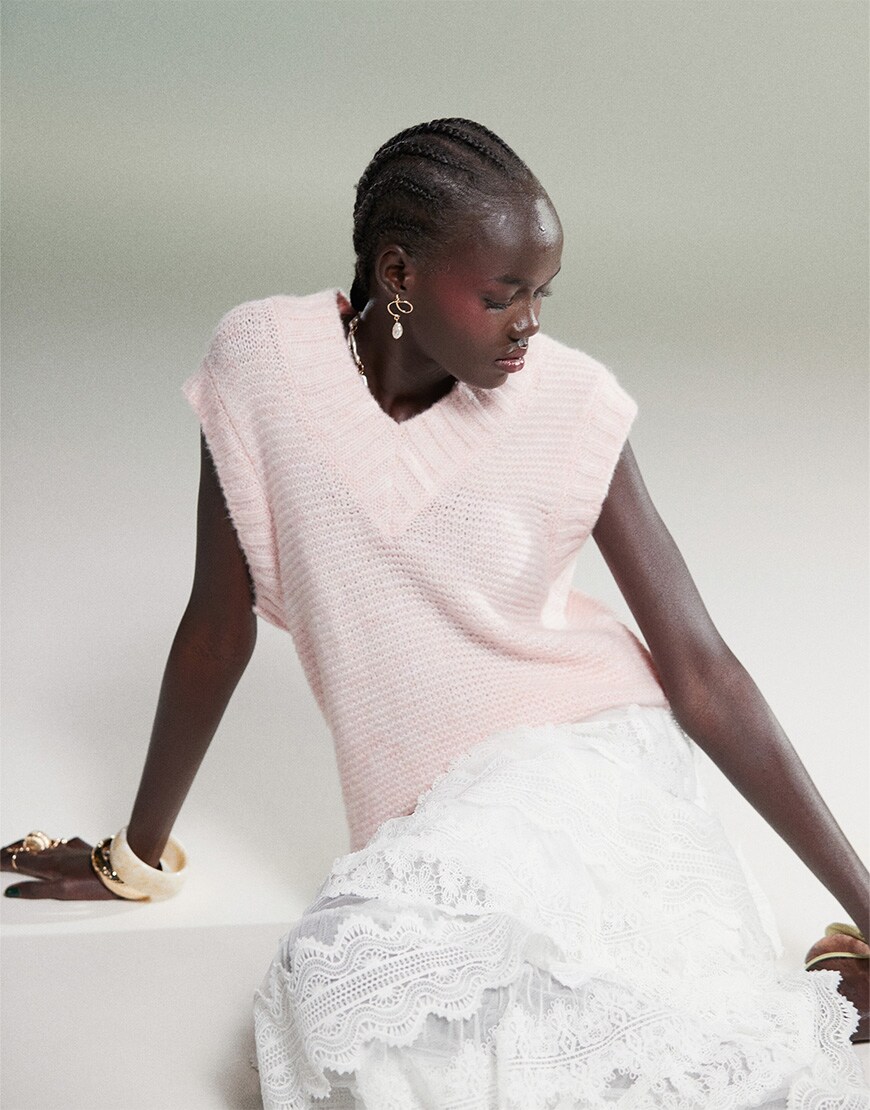 Model wearing pink vest knit | ASOS Style Feed