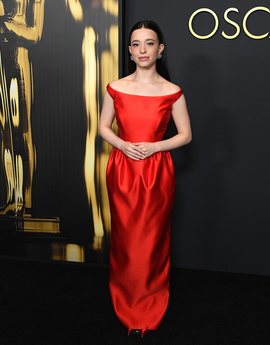 Mikey Madison wearing a red satin maxi dress