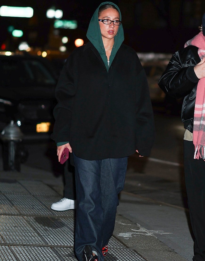 Tate McRae wearing an oversized hoodie and jacket | ASOS Style Feed