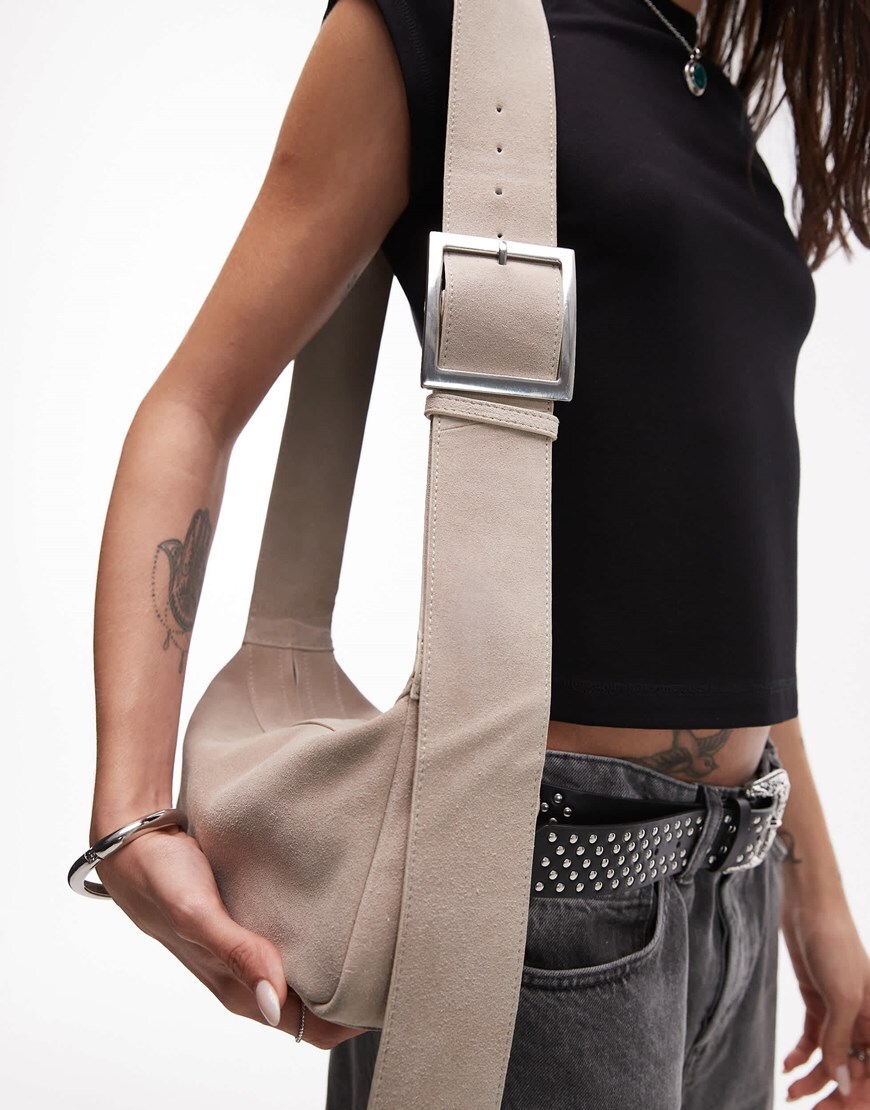 A model wearing a cream shoulder bag | ASOS Style Feed