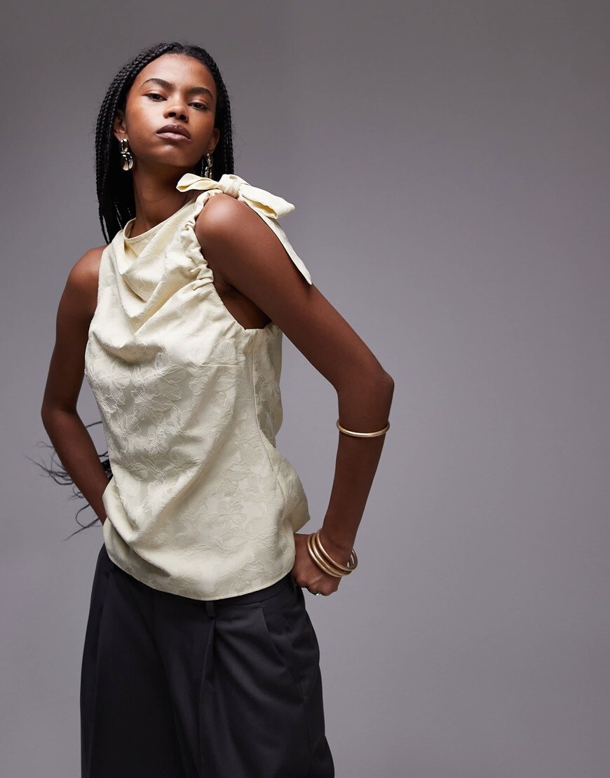 A model wearing a buttermilk ruched top | ASOS Style Feed