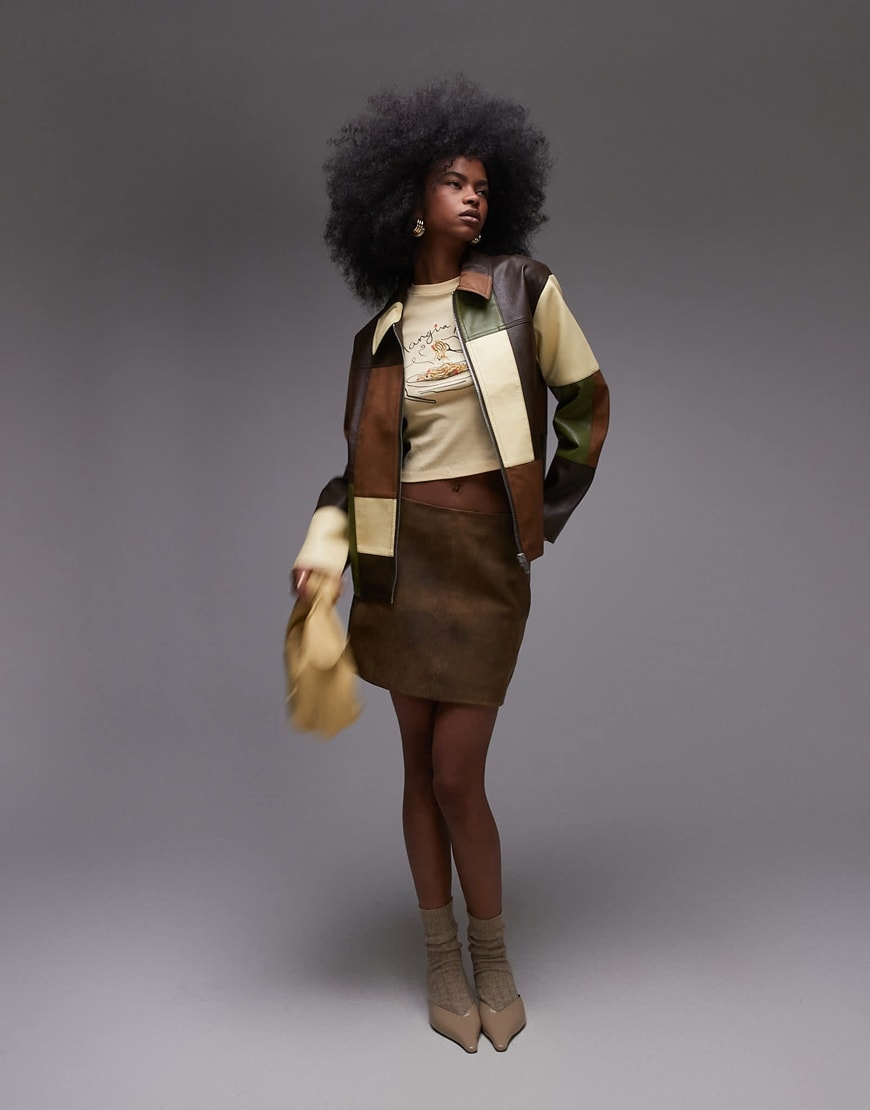 A model wearing a brown patchwork faux leather jacket | ASOS Style Feed