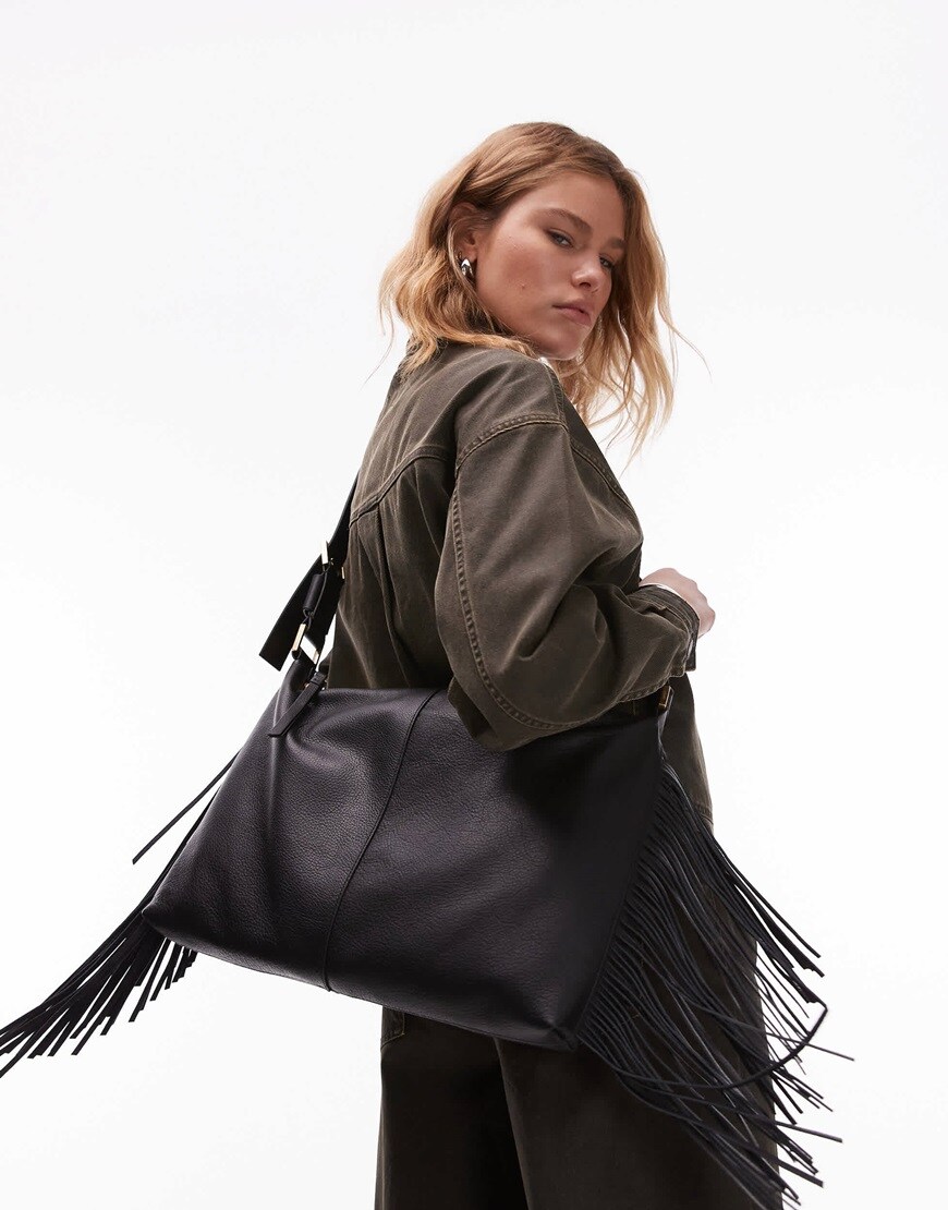AllSaints Edbury suede fringe shoulder bag in black | ASOS Style Feed