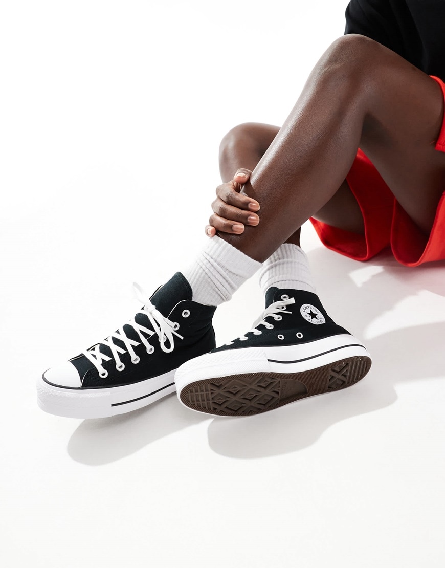 Black platform hi-top Converse trainers