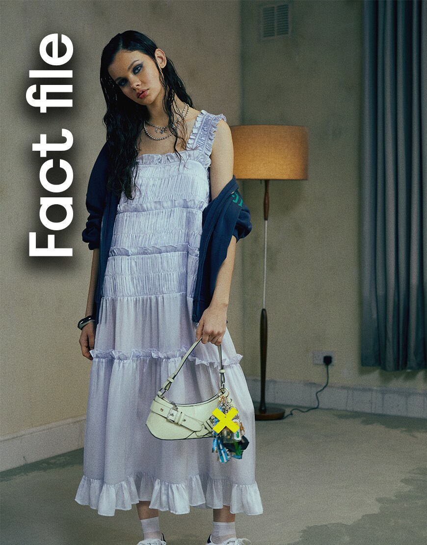 Donata wearing a satin maxi dress, hoodie and adidas trainers | ASOS Style Feed