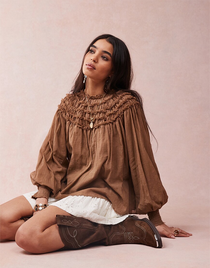 Model wearing a brown top | ASOS Style Feed