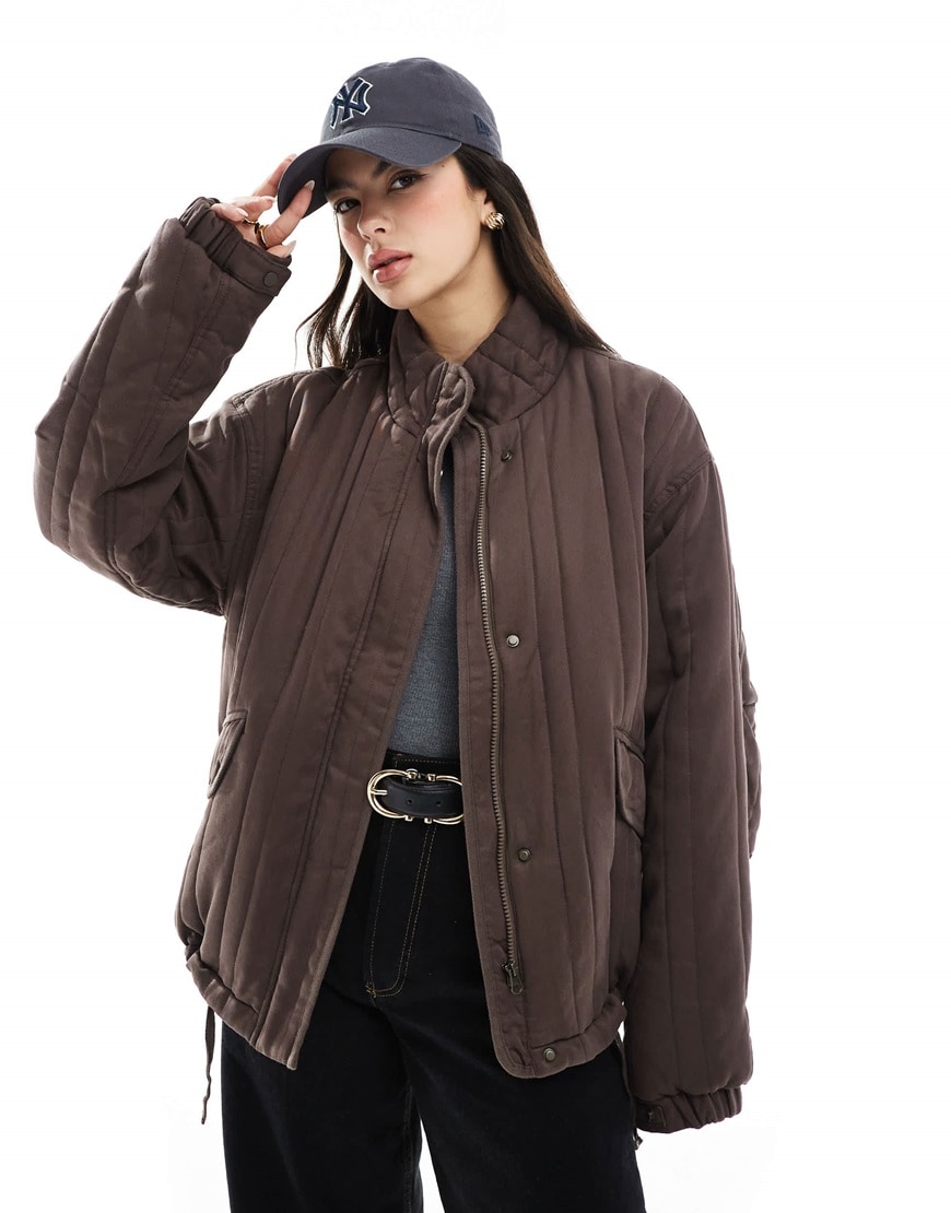 Model wearing brown quilt jacket | ASOS Style Feed