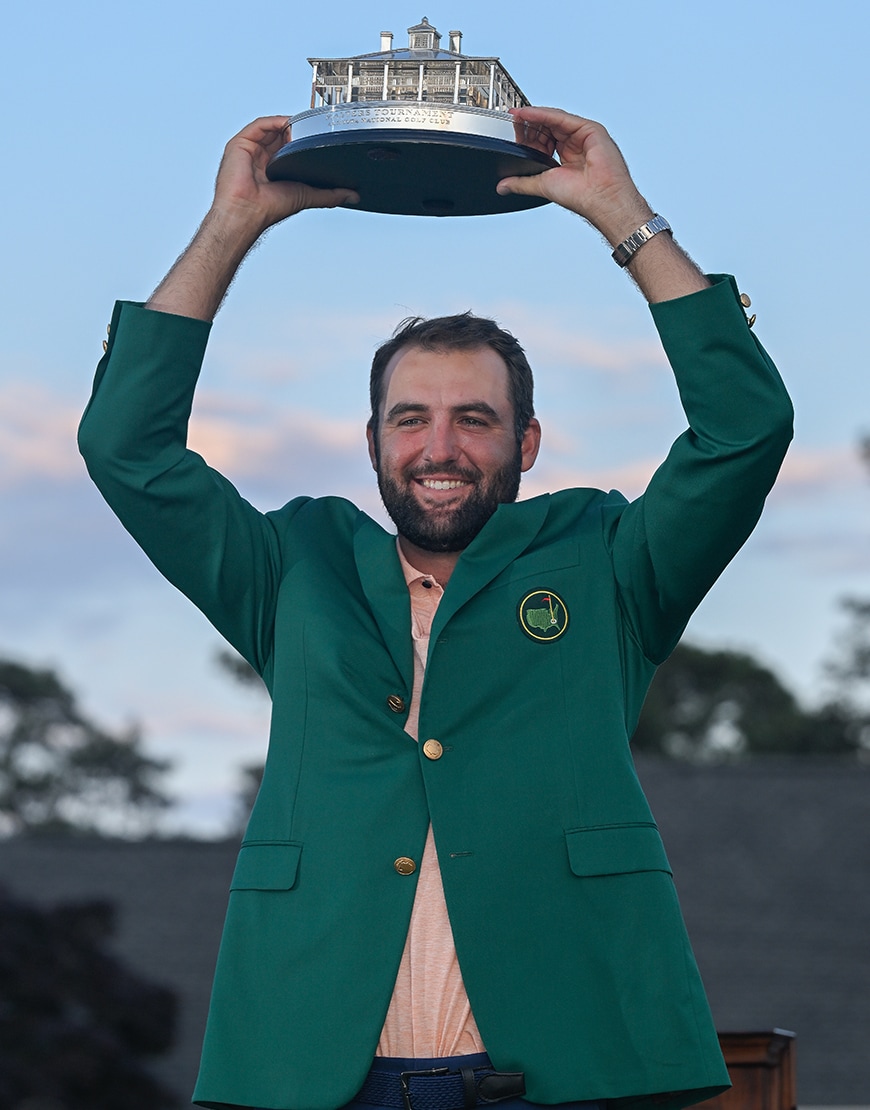Scottie Scheffler holding a trophy