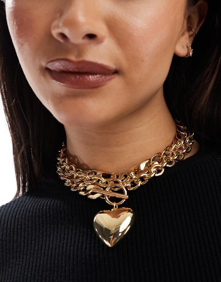 ASOS DESIGN Limited Edition statement necklace with multi chain and puff heart detail in gold tone | ASOS Style Feed