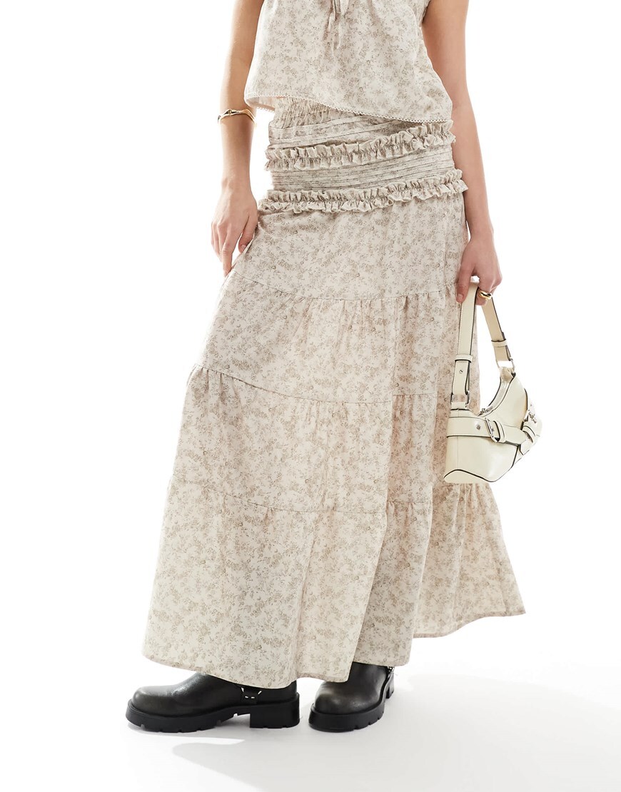 Model wearing a floral maxi skirt