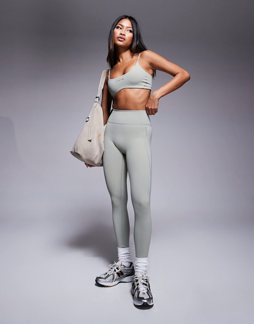 Model wearing a grey activewear set