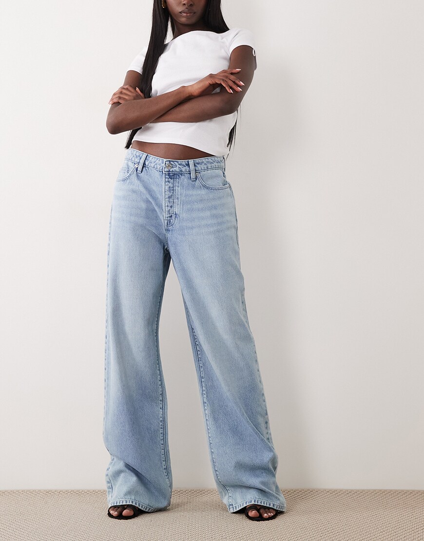 model wearing Good American jeans|ASOS Style Feed