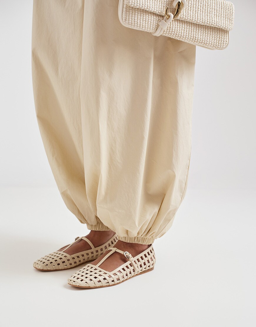 model wearing beige Dolce Vita shoes|ASOS Style Feed