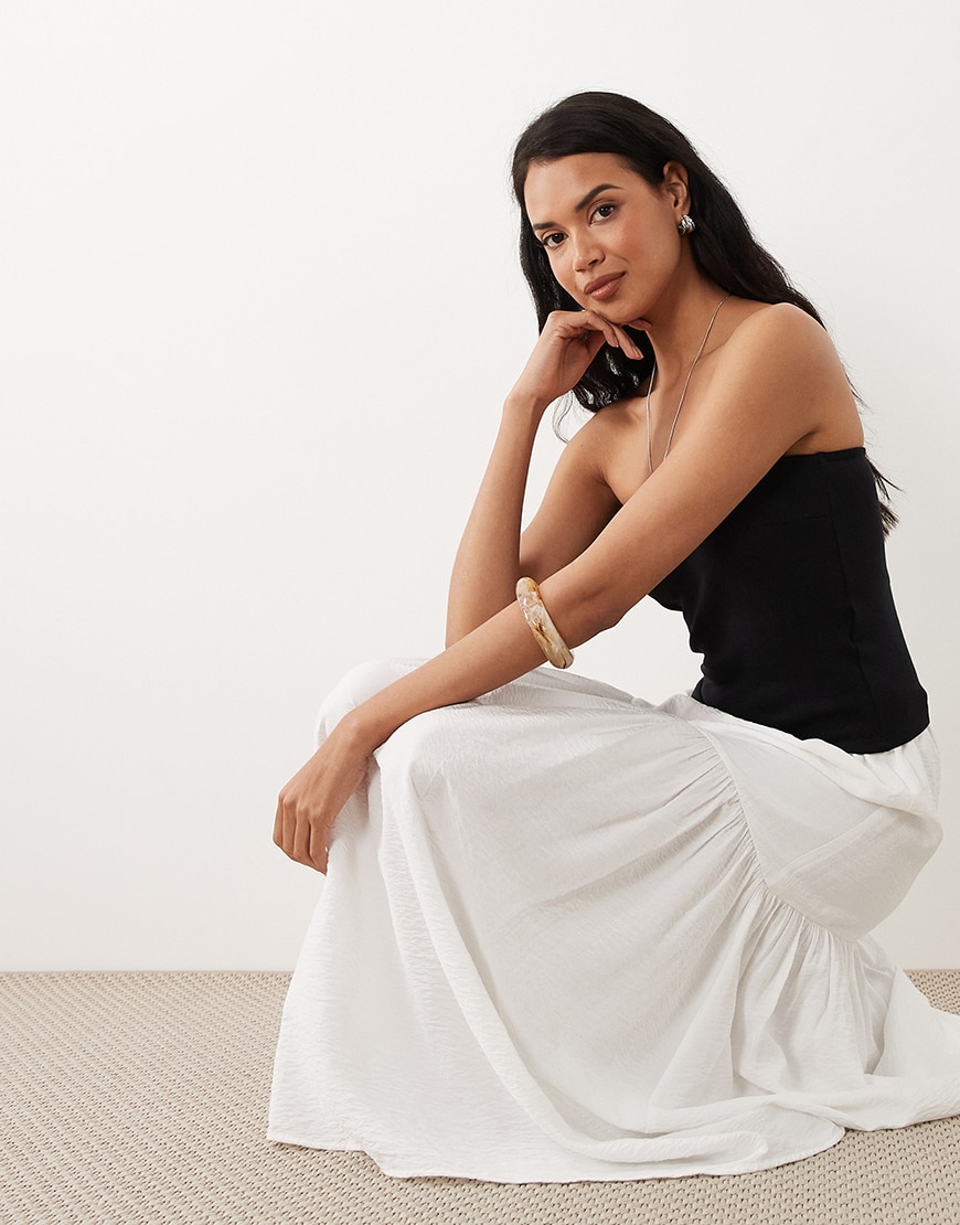model wearing Gina Tricot skirt|ASOS Style Feed