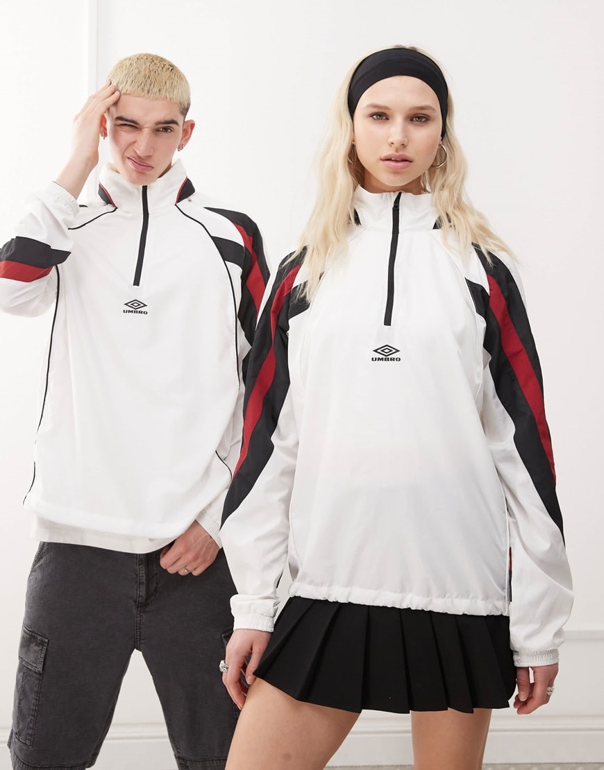 Male and female models wearing white Umbro jackets