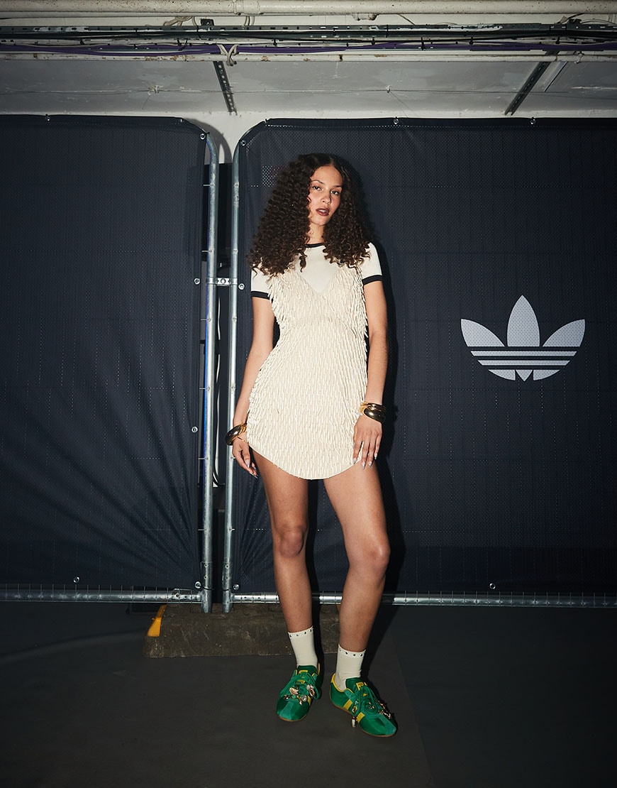 Woman wearing adidas Originals sneakers and embellished white dress | ASOS Style Feed