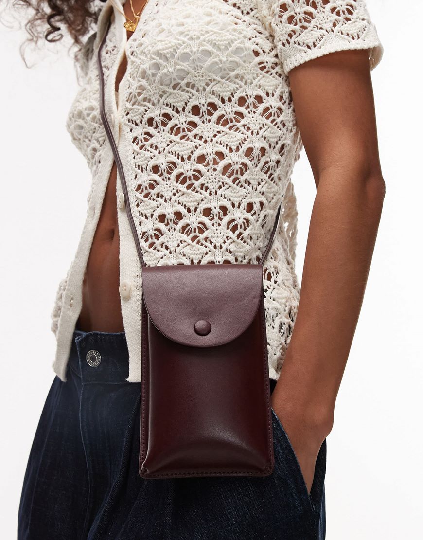 ARKET leather cross body phone case in burgundy | ASOS Style Feed