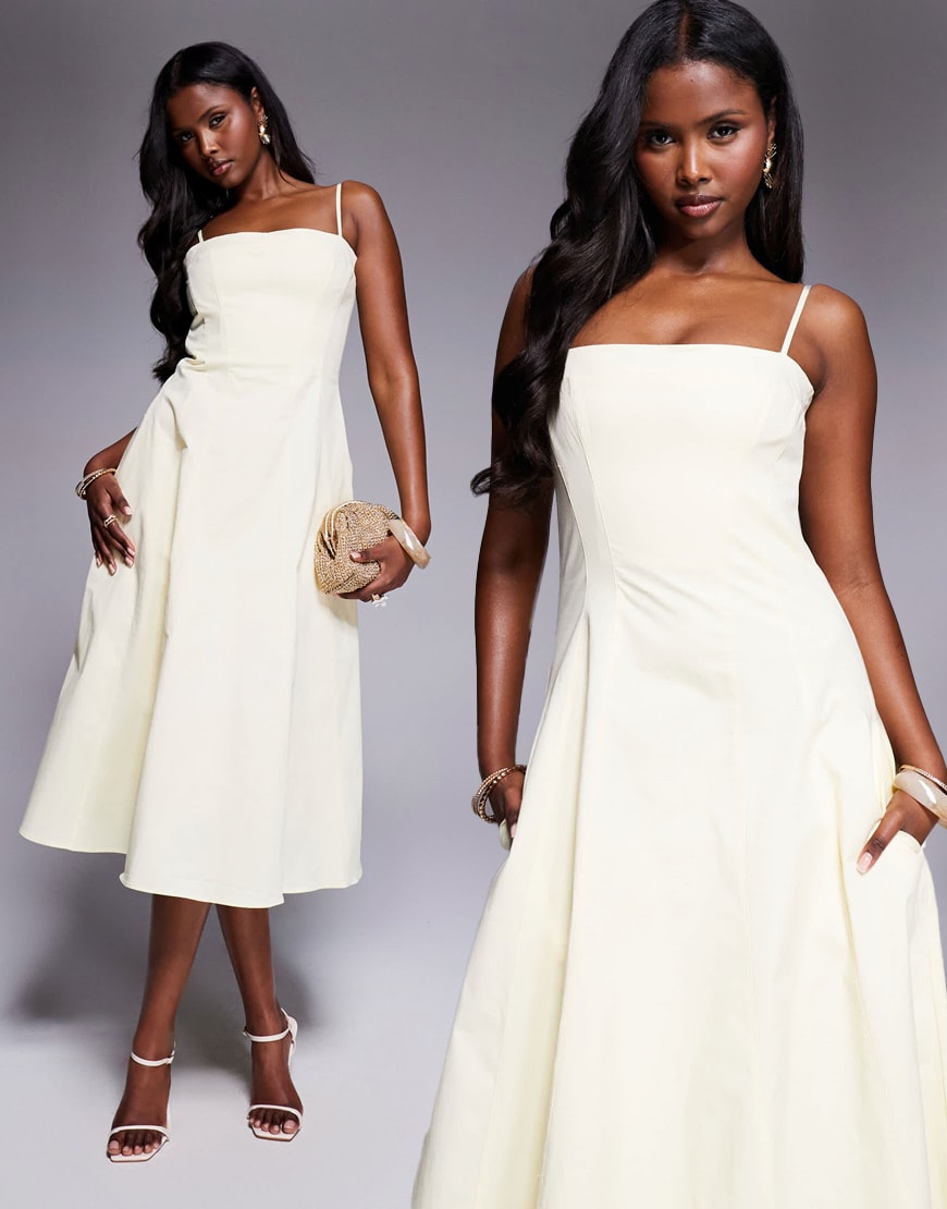 Model wearing a yellow maxi dress