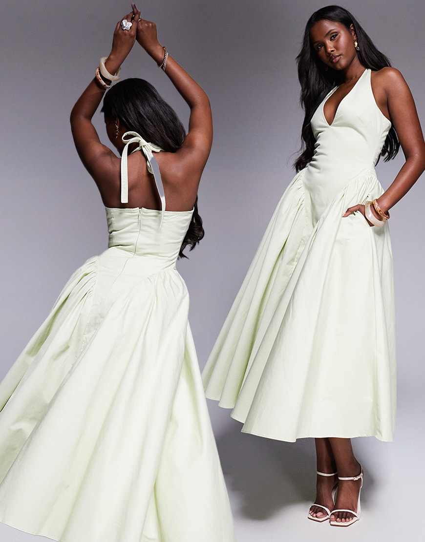 Model wearing a green maxi dress
