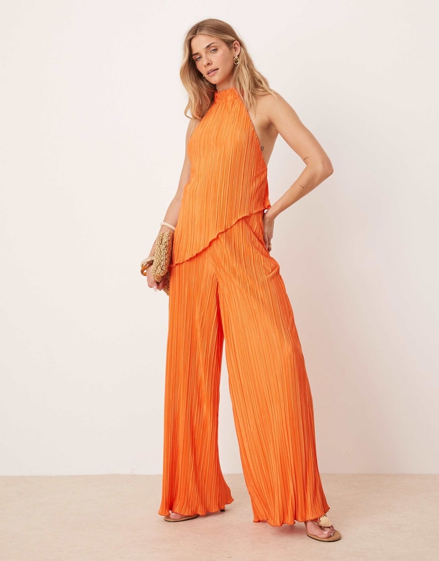 ASOS DESIGN plisse halter neck wide leg jumpsuit in orange | ASOS Style Feed
