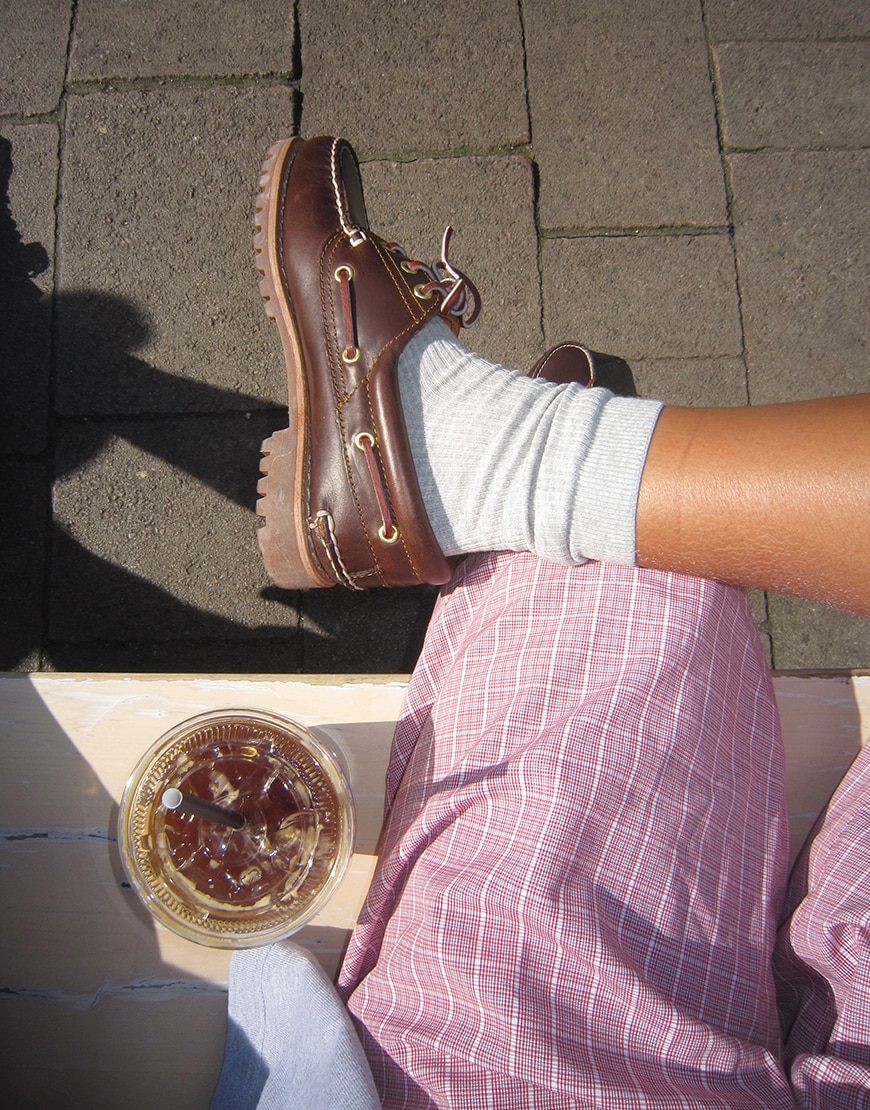 Timberland boat shoes on a woman's feet