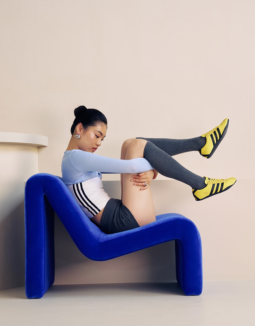 Woman wearing adidas Tokyo in black and yellow | ASOS Style Feed