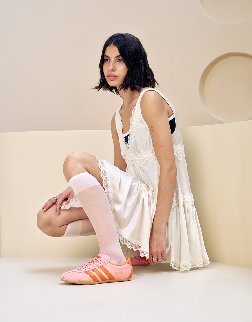 Woman wearing adidas Tokyo trainers in pink and red | ASOS Style Feed