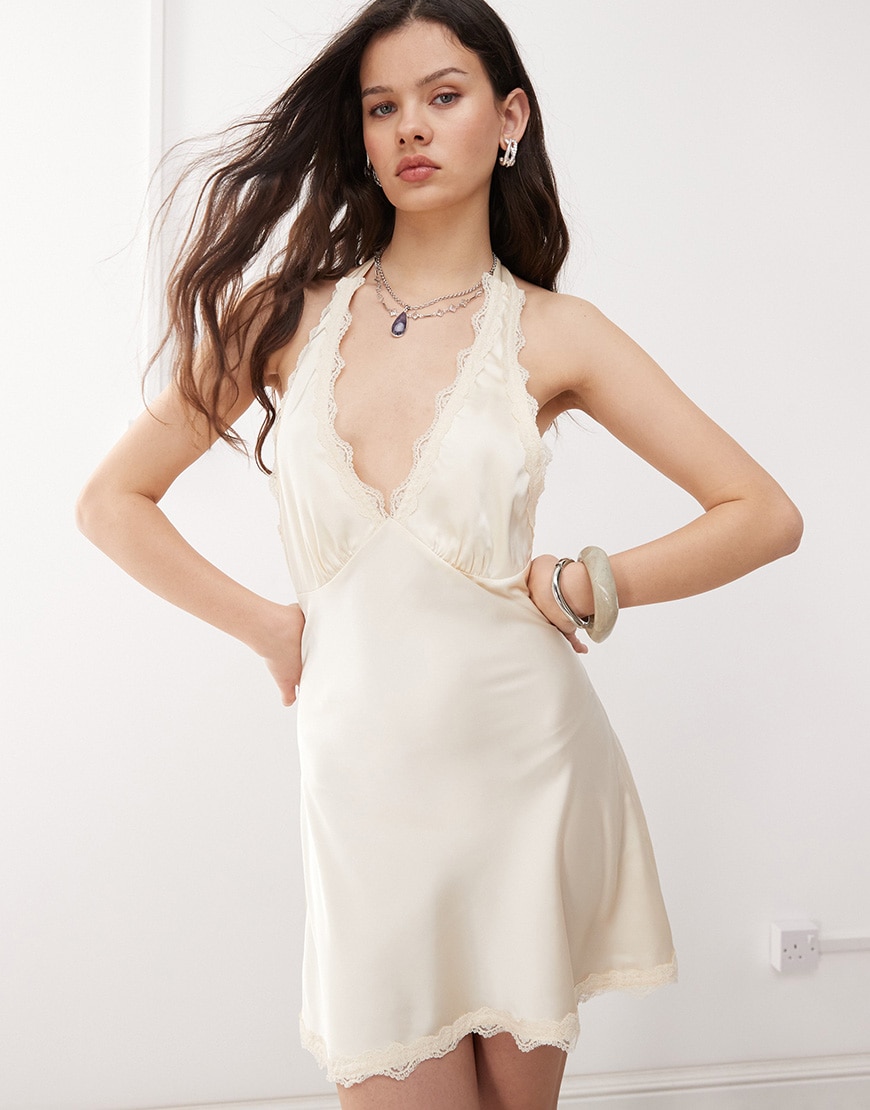 Lioness Stars Align satin lace trim halterneck plunge mini slip dress in cream | ASOS Style Feed