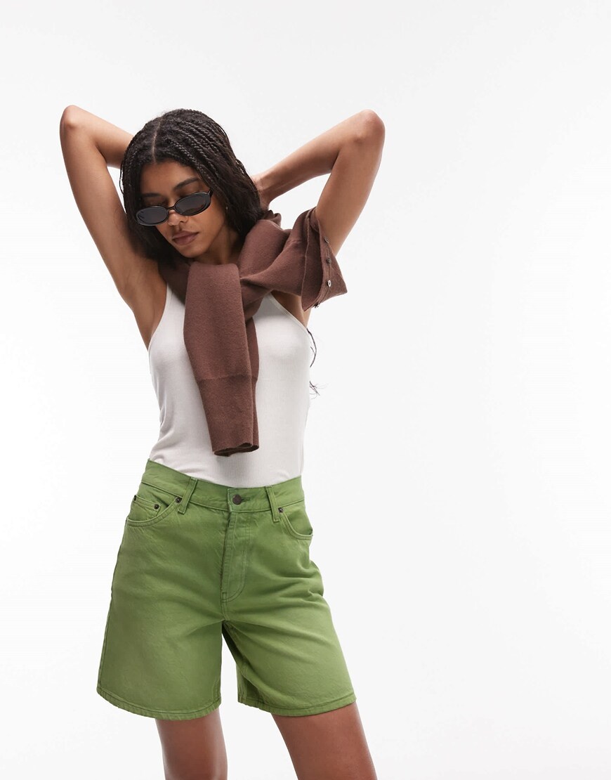 A model wearing denim jorts in dill green | ASOS Style Feed