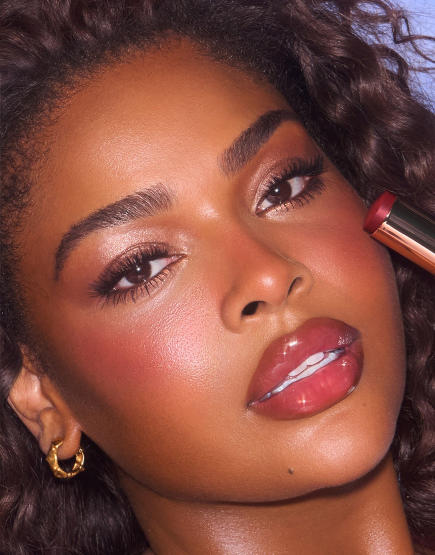 Model wearing Charlotte Tilbury Blush | ASOS Style Feed