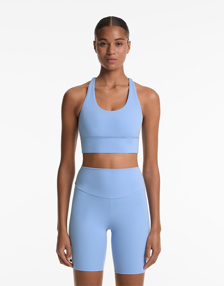 Oysho Medium-support comfortlux sports bra with cups in pale lavender blue | ASOS Style Feed