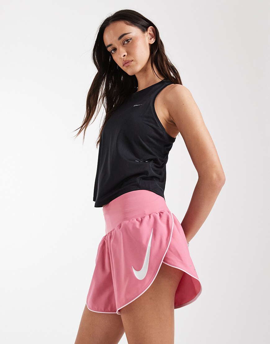 Nike Running Tempo Dri-FIT mid rise swoosh shorts in pink | ASOS Style Feed