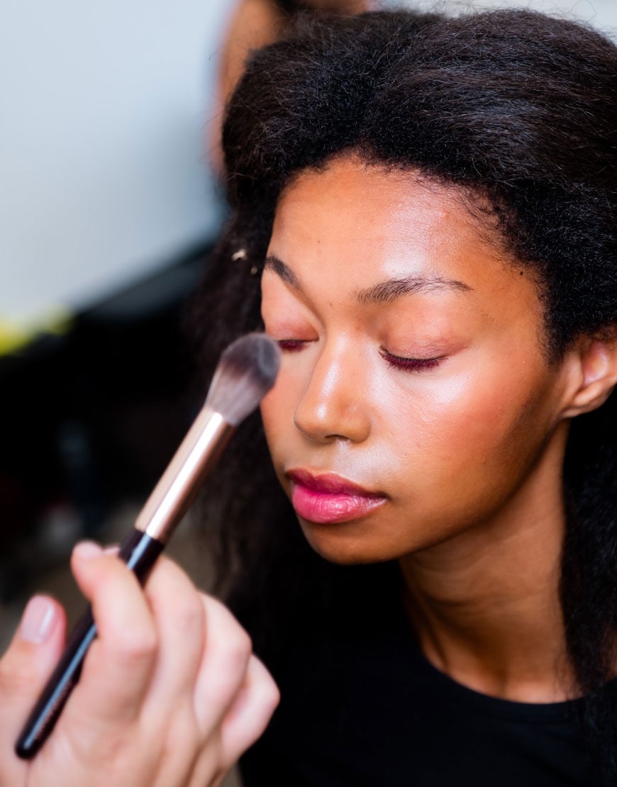 Model Getting her Makeup Done by Charlotte Tilbury